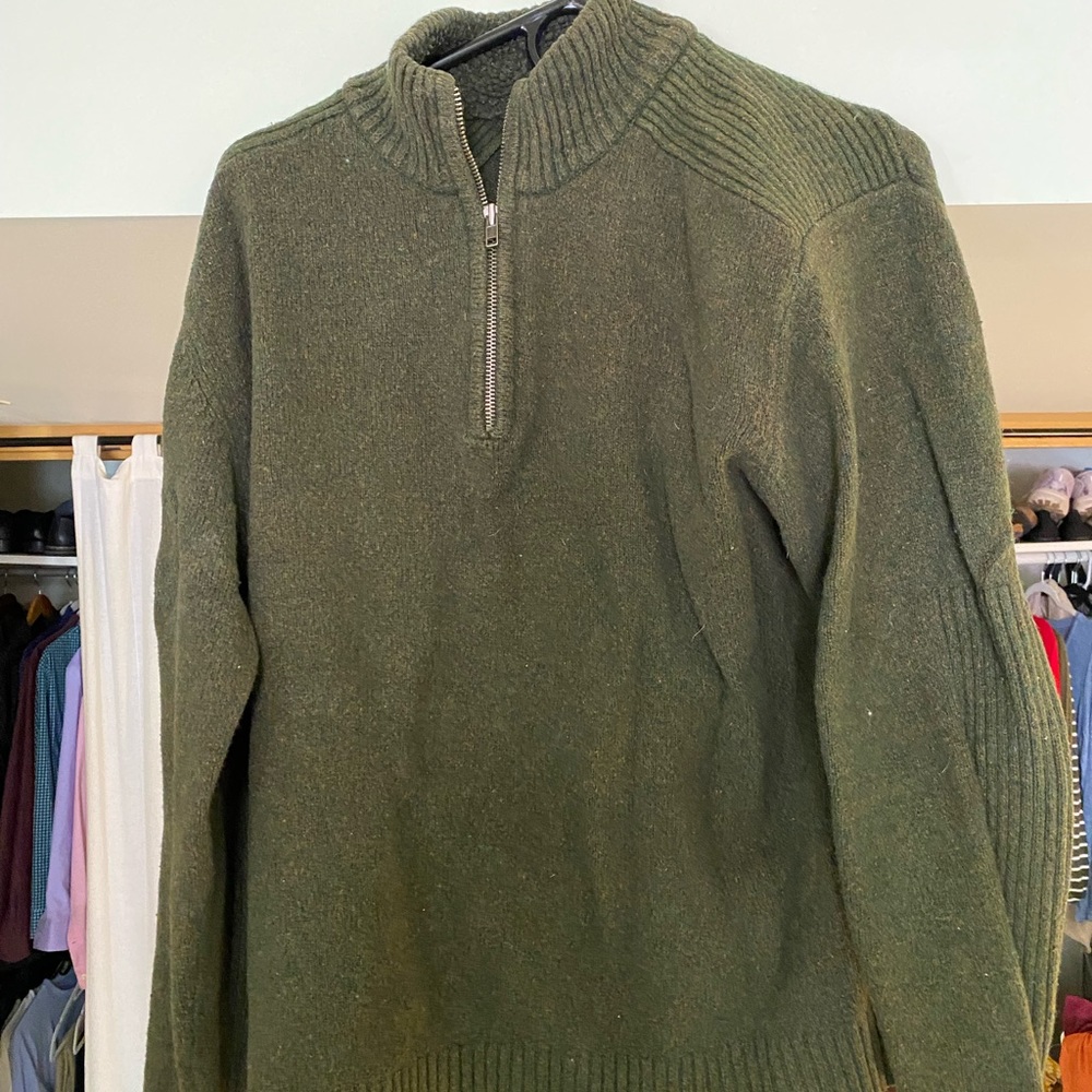 Green quarter-zip sweater